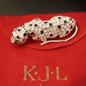 Kenneth J. Lane for Avon Rhinestone panther pin/brooch